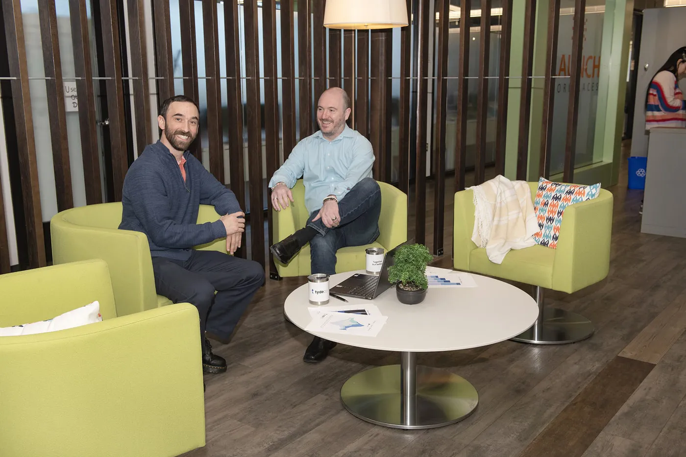 Tydeco staff members having a meeting