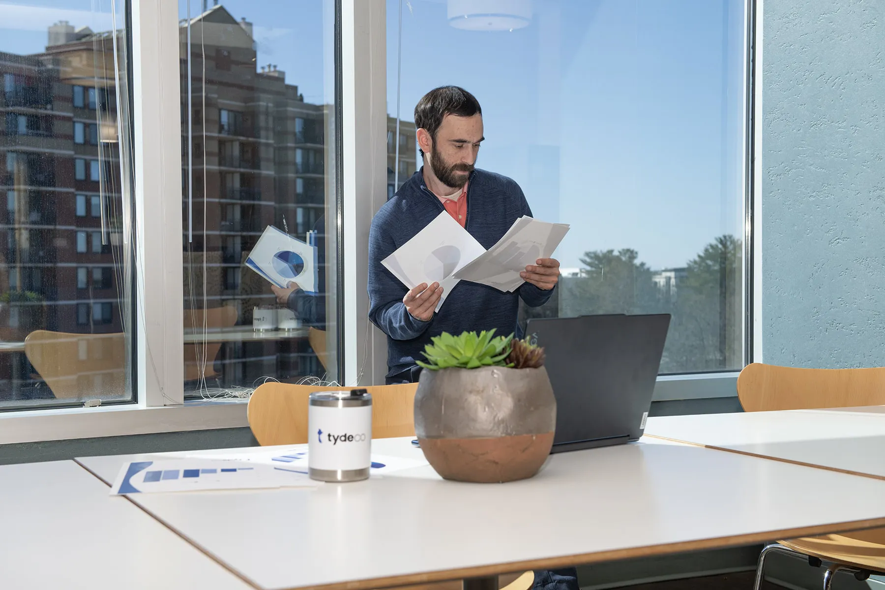 worker in an office looking at documents